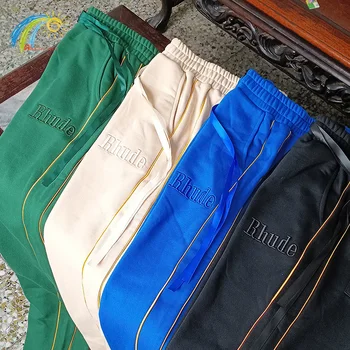 الرجال عارضة الذهب مخطط Rhude السراويل الرباط الشريط الكلاسيكية شعار التطريز RHUDE Sweatpants الأخضر والمشمش بنطلون